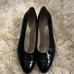 Black Ferragamo snakeskin pumps